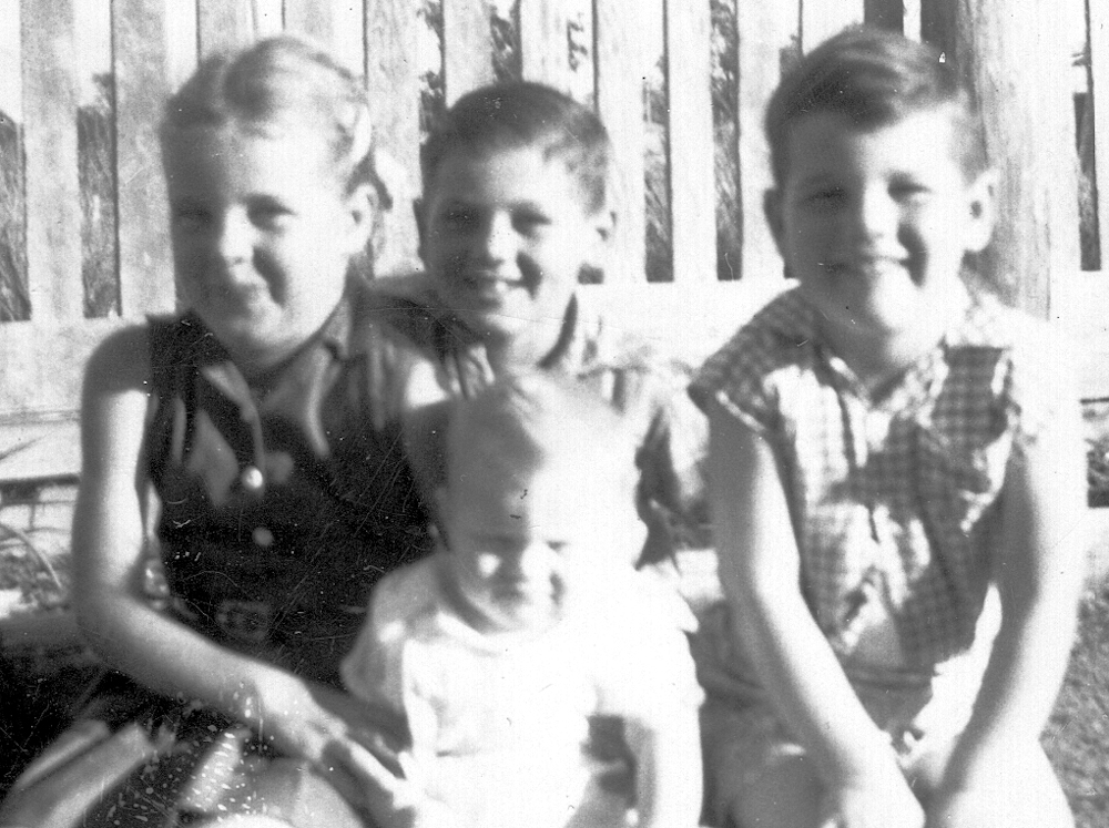 Annette as a baby in 1958 with her sister Denise and brothers Don and Warren