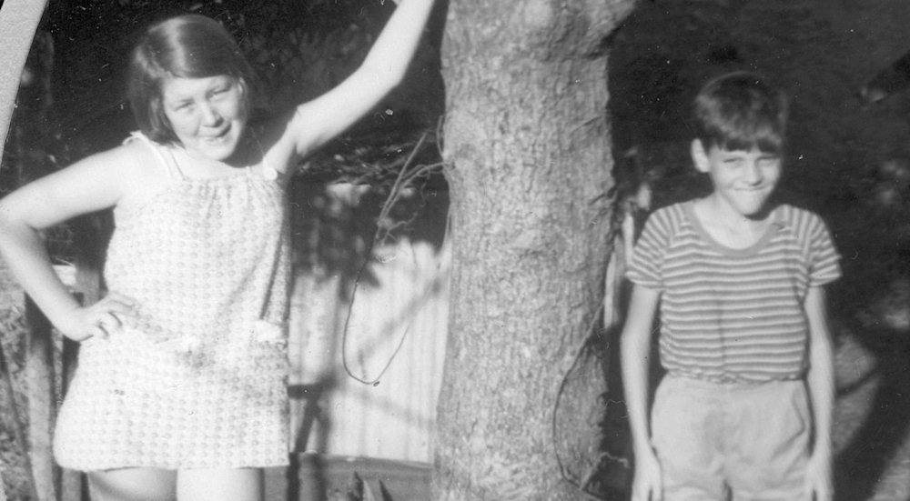 Annette with her brother Kevin around 1964 at 2 Flynn St, Rockhampton.